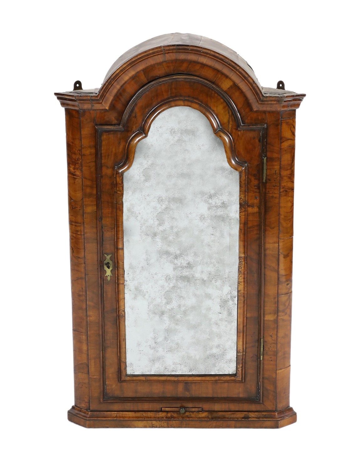 A Queen Anne walnut hanging corner cupboard, width 64cm, depth 34cm, height 104cm